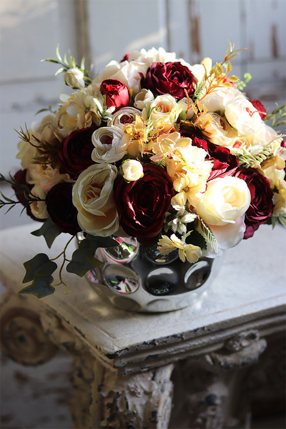 Ferina, kompozycja kwiatowa w lustrzanym naczyniu, wym.22x32cm 