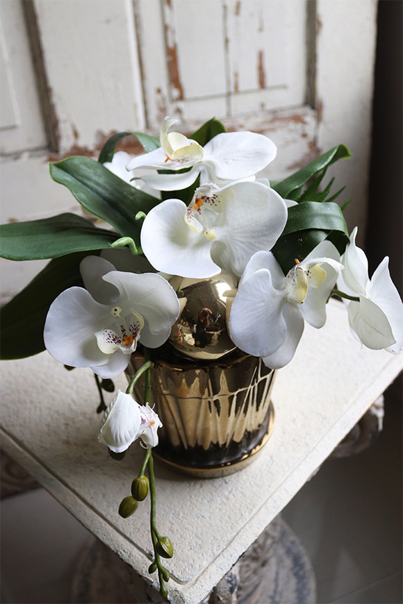 Dekoria Luxy, kompozycja ze storczykiem w złotej donicy, wym.25x30cm 