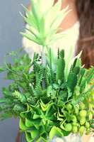 Kredina Twarzova, kompozycja Sukulenty w donicy z twarzą, wys.39cm