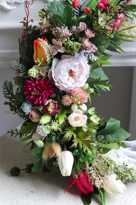 Reymont, asymetryczny wianek dekoracyjny