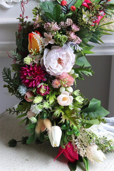 Reymont, asymetryczny wianek dekoracyjny