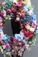 Caryca Nellia, duży kolorowy wianek