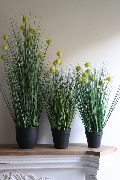 Romelia sztuczna trawa kwitnąca w donicy