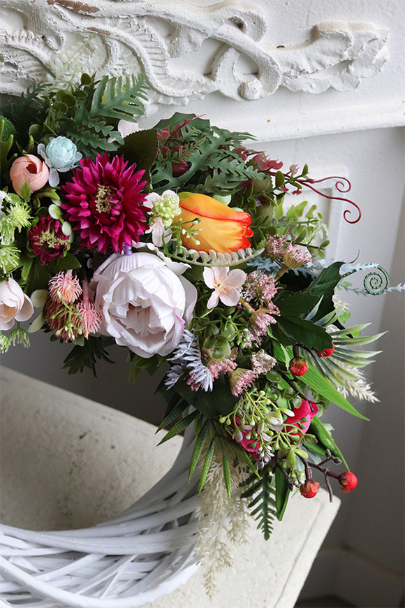 Reymont, asymetryczny wianek dekoracyjny