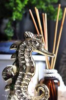 Pacific, figurka konik morski, złoty