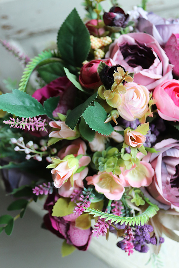 Grefiano, kompozycja kwiatowa w szarej donicy, wym.30cm