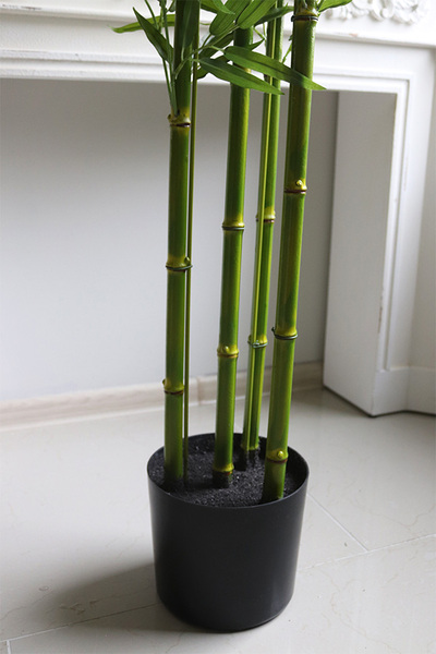 Bambus, sztuczna roślina w osłonce z tworzywa
