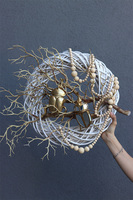 Skarabeusz 2, złoty wianek na drzwi