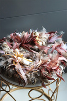 Gniazdko, wielkanocny wianek z piórami