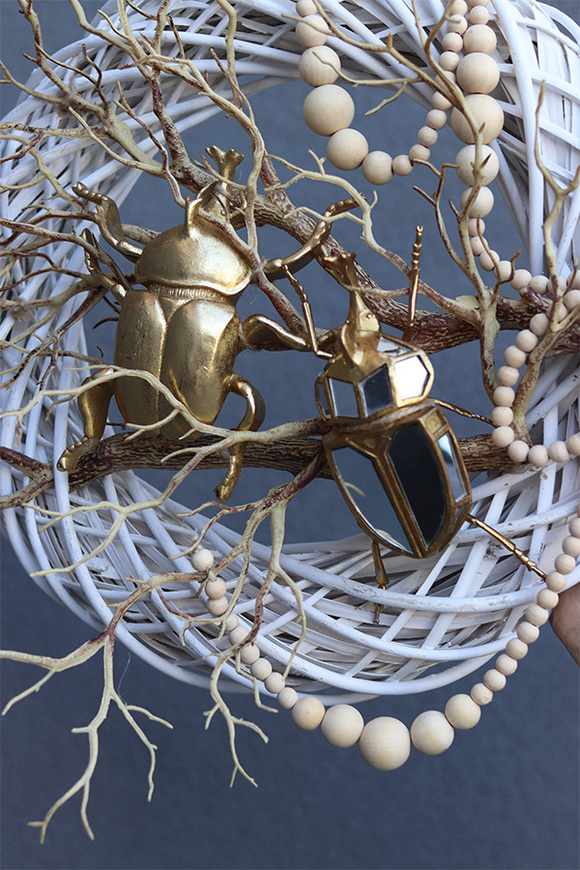 Skarabeusz 2, złoty wianek na drzwi