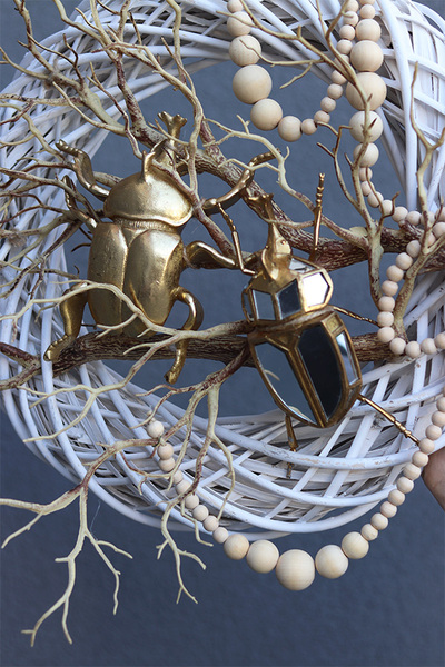 Skarabeusz 2, złoty wianek na drzwi