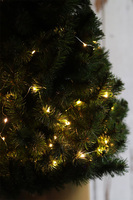 Konika Fera B, choinka sztuczna w donicy na stojaku