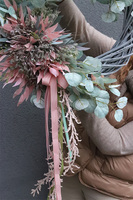 Krenata, asymetryczny wianek na drzwi