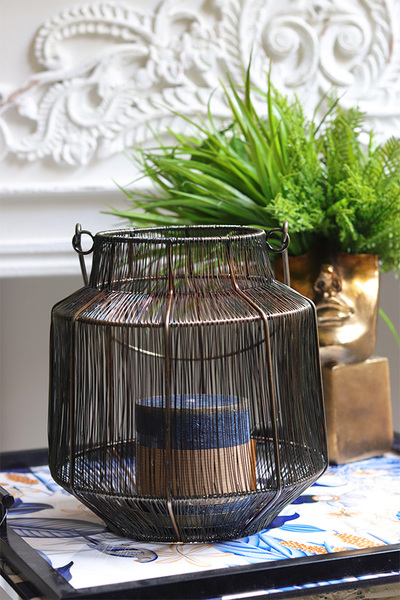 Mauritia, metalowy lampion kaganek