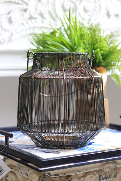 Mauritia, metalowy lampion kaganek