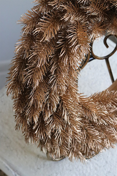 Złoty Dom, dekoracyjny wianek ze złotych gałązek