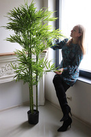 Bambus, sztuczna roślina w osłonce z tworzywa