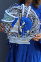 marynistyczny wianek z łódką