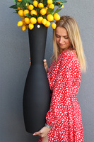 Limone, bukiet cytryny w wysokim wazonie