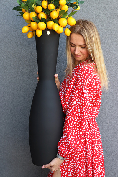 Limone, bukiet cytryny w wysokim wazonie