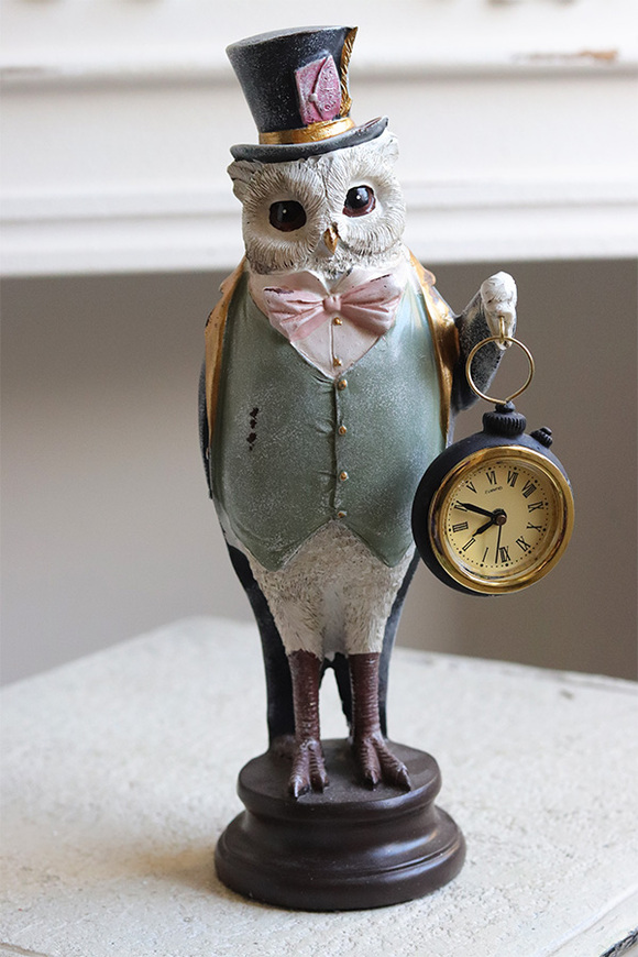 Alicja w Krainie Czarów, figurka sowa z zegarkiem