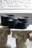 Black Volcan czarna doniczka na kwiaty z podstawką walec