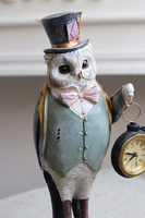 Alicja w Krainie Czarów, figurka sowa z zegarkiem