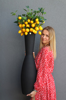 Limone, bukiet cytryny w wysokim wazonie