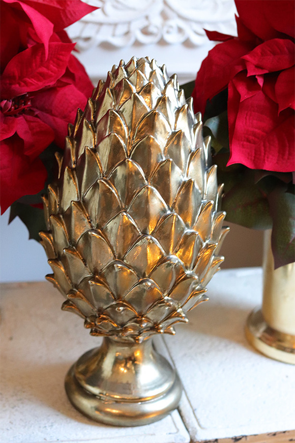 Karczoch Glosti D, złota figurka dekoracyjna	