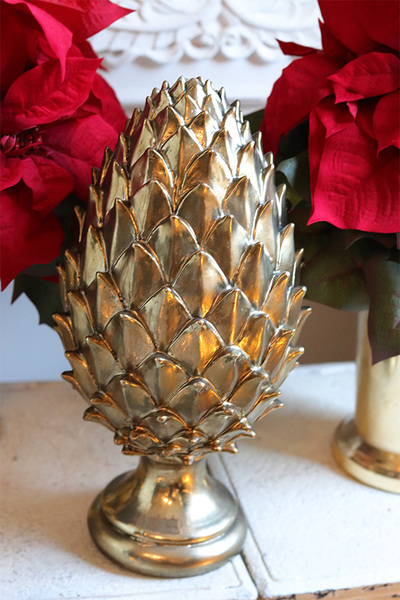 Karczoch Glosti D, złota figurka dekoracyjna	