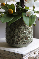 Nedila, sztuczny storczyk w metalowej osłonce