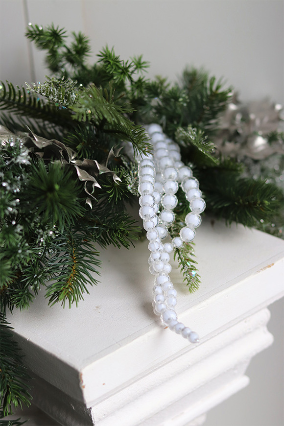 Laluna, zielona girlanda na kominek