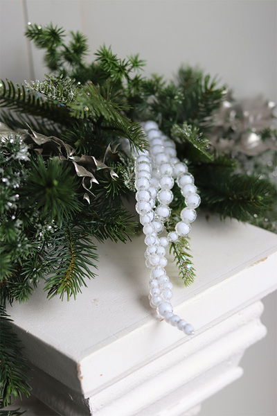 Laluna, zielona girlanda na kominek