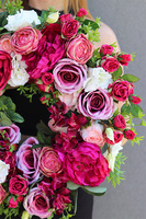 Caryca Delicja, różowy wianek na drzwi	