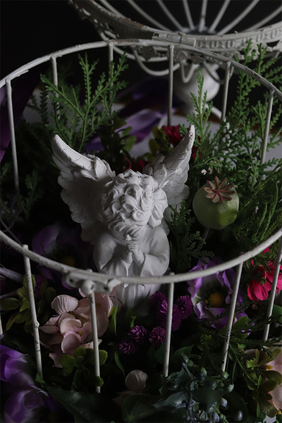 Santo Angelo, dekoracja nagrobna w klatce