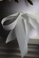 Rosana Benita, flowerbox różany z kokardą