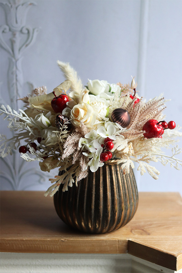 Kremona, zimowa kompozycja z jabłkami i suszem