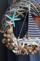 Żaglówka, marynistyczny wianek z łodzią