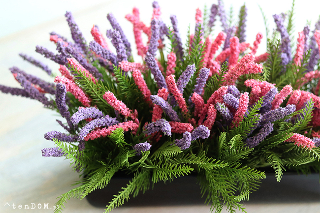 Cipriano 2 Wrzosy, kompozycja kwiatowa w czarnej donicy, wym.20x40cm