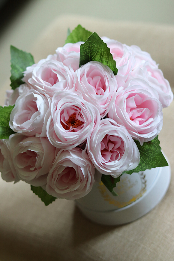 Tenoa, efektowny flowerbox z różowymi kwiatami, wys.21cm