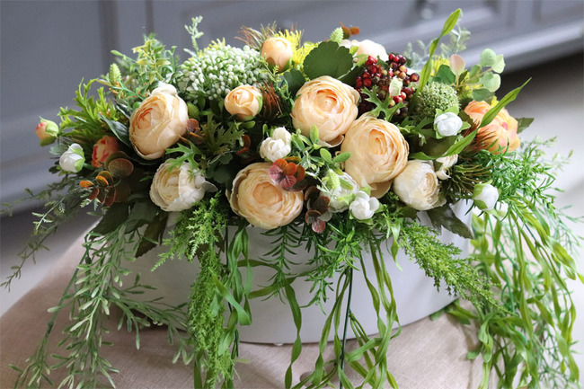 Manfredo Sun, kremowo - żółta kompozycja w ceramicznej donicy, wys.27cm