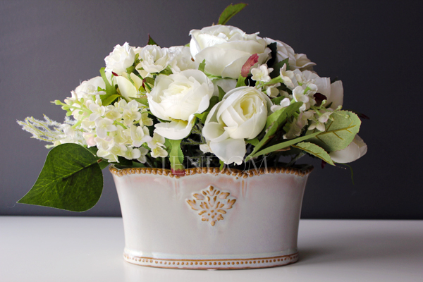 kompozycja kwiatowa / bukiet Sensenia wys.22cm, dł. kompozycji 30cm