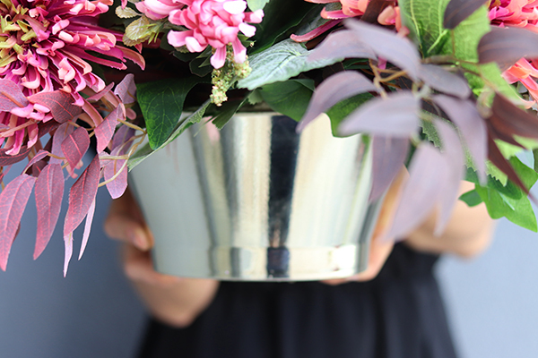 Astry, kompozycja kwiatowa nagrobna, wys. 42, rozp.70cm