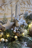 Melinia, adwentowy stroik z reniferem w pucharze