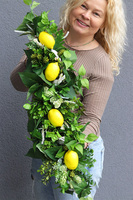 Cytryny, zielona girlanda dekoracyjna z owocami