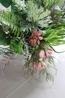 Jeromena, kompozycja z trawami w biało-srebrnej donicy, wys.72cm