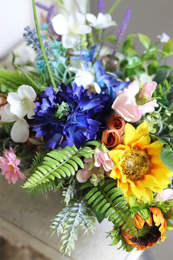 Leonia, kompozycja kwiatowa w naczyniu