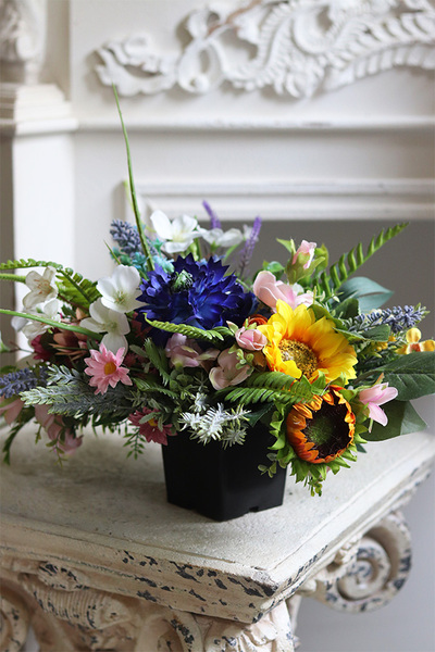 Leonia, kompozycja kwiatowa w naczyniu