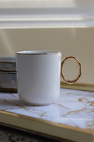 Novelty, porcelanowy kubek ze złotym rantem