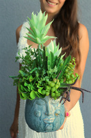 Twarzova, komplet zielonych dekoracji w doniczce z twarzą